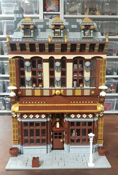 a toy house made out of legos in a store