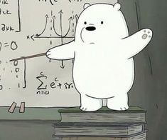 a white bear standing on top of a pile of books in front of a blackboard