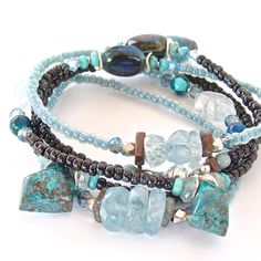 Nixie: Aquamarine Wrap Bracelet.  Full of unique beads and gemstones, this stunning  bracelet can also be worn as a chic necklace. Eccentric Jewelry, Boho Prom, Memory Wire Jewelry, Boho Chic Necklace, Boho Beautiful, Aquamarine Bracelet, Stone Jewellery, Stone Bracelets, Chic Necklace