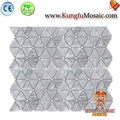 an image of a white marble mosaic tile with hexagonal design on the side