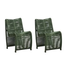 two green chairs sitting next to each other