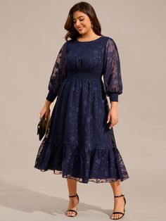 The Plus Size Long Sleeve Round Neckline Midi Chiffon Wedding Guest Dress offers a blend of comfort and sophistication. With its elegant round neckline and long sleeves, this midi dress is crafted from lightweight chiffon that drapes beautifully, creating a flattering silhouette. Ideal for weddings and other formal events, it offers both style and ease, making it a perfect choice for plus-size guests.