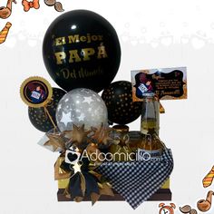 an assortment of balloons and confetti in a gift box for someone's special occasion