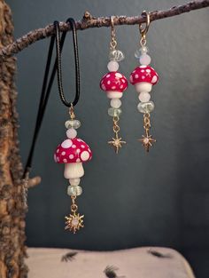 Find yourself in a whimsical world of your own with this matching pendant and earring set. Mushroom Necklace, Bohemian Dangle Jewelry With Mushroom Design, Mushroom Jewelry Earrings, Red Mushroom Design Earrings Gift, Whimsical Mushroom Drop Earrings, Nature-inspired Dangle Earrings With Mushroom Design, Clay Earrings, Necklace Set, Earring Set