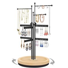 a jewelry rack with multiple necklaces hanging from it's sides on a wooden stand