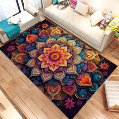 a living room area rug with an intricate flower design on the floor and colorful colors