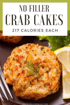 crab cakes on a plate with lemon wedges