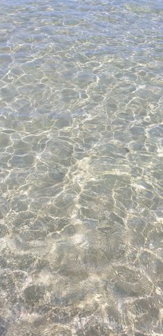 the water is so clear that it appears to be very shallow enough for people to swim in