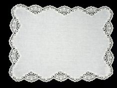 a white doily on a black background with an empty place for the wording