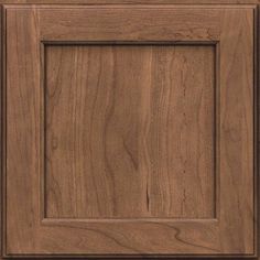 a close up view of a wooden cabinet door