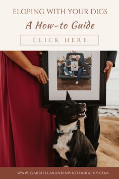 a man and woman holding up a framed photo with their dog