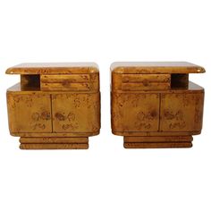 a pair of wooden chests sitting next to each other