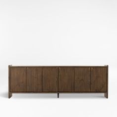 the sideboard is made out of wood and has two doors on each side, one with