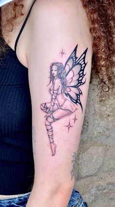 a woman with a tattoo on her arm