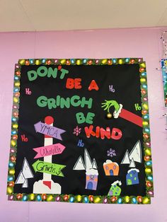 a bulletin board that says don't be a grinch be kind on it