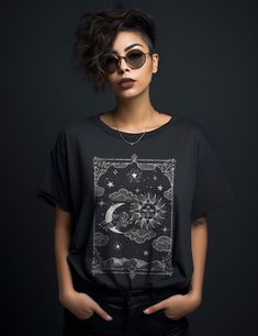 Unleash your inner power with the Sun and Moon Shirt. Designed for witchy souls and modern mystics, this shirt is crafted from 100% breathable cotton, flawlessly merging witchcraft aesthetics with contemporary comfort. Elevate your everyday style and embrace your spiritual journey with this unique addition to your wardrobe staples.Choose from a variety of plus sizes up to 3XL for a roomy fit, or size up for an oversized look.Surprise any of your witchy friends with a gift they would love! Breath Black Bohemian Top For Alternative Fashion, Black Bohemian Tops For Halloween, Black Bohemian Top For Halloween, Black Bohemian Shirt For Festival, Black Bohemian Relaxed Fit Shirt, Mystical Black Top With Graphic Print, Mystical Black Tops With Graphic Print, Black Moon Print Top For Festivals, Witchy Friends