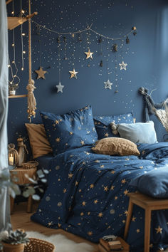 a bedroom with blue walls and gold stars on the wall, along with a bed