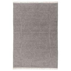 a gray rug with an intricate design on the front and back side, in grey tones