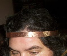 "Rustic recycled hammered copper tubing made into a circlet, headband, crown. It is adjustable with a leather tie in the back and can be worn by men or women. I darkened it then sanded to shined. Wear for weddings, costumes, cosplay, or anything else you like. # Item care # This particular circlet can be sealed as to not cause you to turn colors while wearing. Please let me know if this is preferred. Please Note that some combs, hair pins and some crowns are rough soldered By design and have bee Medieval Crowns, Circlet Crown, Medieval Crown, Headband Crown, Ren Fair, Hair Accessories Wedding, Cersei Lannister, House Stark, Leather Tie