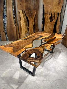 a table made out of wood with metal legs