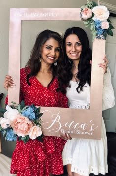 two women holding up a sign that says berea's bridal shower