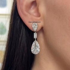 10K White Gold Teardrop Earrings, Pear And Baguette Cut Moissanite Diamond Women's Earrings, Bridal Wedding Earrings, Screw Back Earrings Detail about stones Moissanite & Simulated Stone: ----------------------------- ➠Stone Shape : Pear, Baguette ➠Stone Size : 15x10 MM, 9x6 MM, 6x3 MM ➠Weight: 16.3 TCW ➠Color: Colorless ➠Cut: Excellent ➠Clarity: VVS ✍This Listing's images are only for Imagin about this item. This is all our photography. If you place the order then the same item we can make it. Wedding Diamond Earrings With Baguette Cut, Diamond White Pear-shaped Wedding Earrings, Wedding Diamond White Pear Shaped Earrings, Pear-shaped Diamond Earrings For Wedding, Pear-shaped Diamond White Wedding Earrings, Pear-shaped Diamond White Earrings For Wedding, Pear-shaped Brilliant Cut Bridal Earrings For Wedding, Wedding Diamond Earrings With Baguette Diamonds, Wedding Diamond White Earrings With Baguette Diamonds