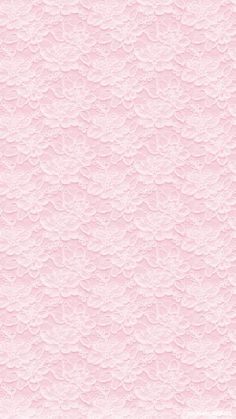 a pink textured background with white flowers