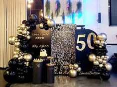 the 50th birthday decorations are all gold and black