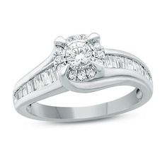 a white gold engagement ring with baguettes and diamonds