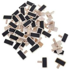 several pieces of wood with black and white squares on them, all in different sizes