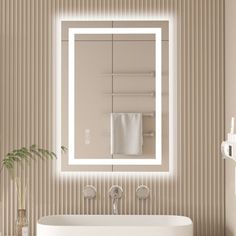 a white sink sitting under a bathroom mirror next to a wall mounted faucet