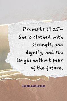 a torn piece of paper with the words provers 1215 - she is clothed with strength and dignity, and the laughs without fear of the future