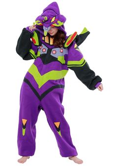 a woman in a purple and green costume is standing with her hands on her hips