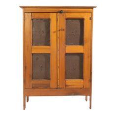 an old wooden cabinet with glass doors