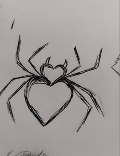 a drawing of a spider with a heart on it's back and eyes drawn by someone