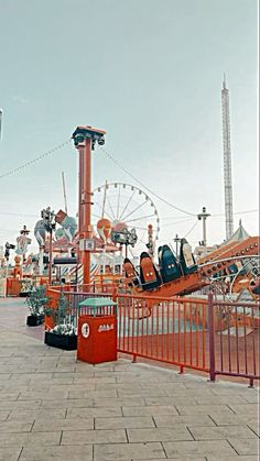 an amusement park with many rides and carnival rides