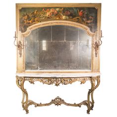 an ornately decorated mirror is shown against a white background