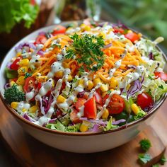 a colorful salad with dressing in a bowl