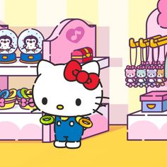 hello kitty is standing in front of a store display filled with donuts and other items