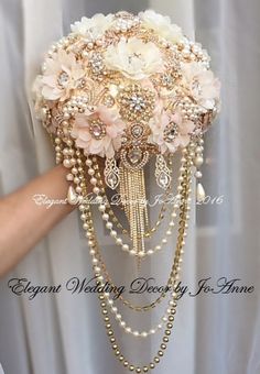 a bridal bouquet with pearls and flowers