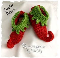 two crocheted red and green baby shoes