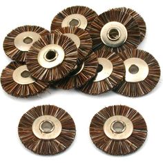 six wire wheel brushes on a white background