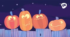 three pumpkins sitting on top of a wooden fence with faces drawn in front of them