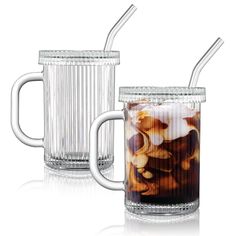 two glass mugs filled with liquid and food