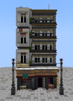 a very tall building with lots of windows and balconies on the top floor