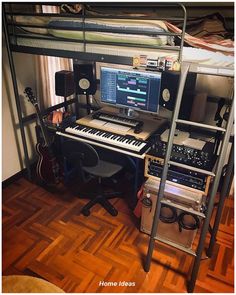 there is a computer and musical equipment on the desk in front of the bunk bed