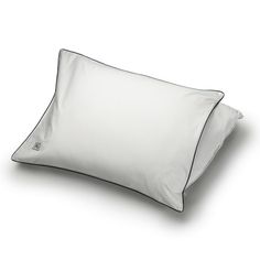 two white pillows sitting on top of each other