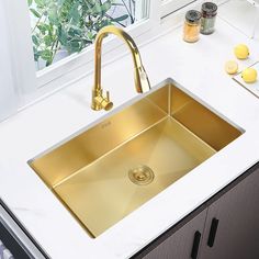 a kitchen sink that is gold in color