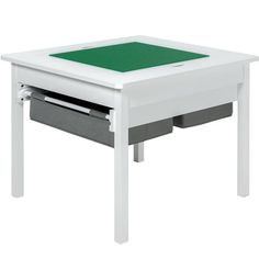 a white table with a green top and drawer underneath the table is shown on a white background