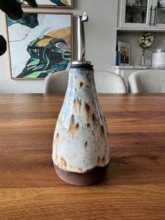 Handmade ceramic oil bottle. The bottle holds about 8oz of liquid.  Cute way to store your olive oil next to your stovetop! Olive Oil Pourer, Pottery Olive Oil Bottles, Ceramic Oil And Vinegar Bottles, Chocolate Clay, Ceramic Bottles